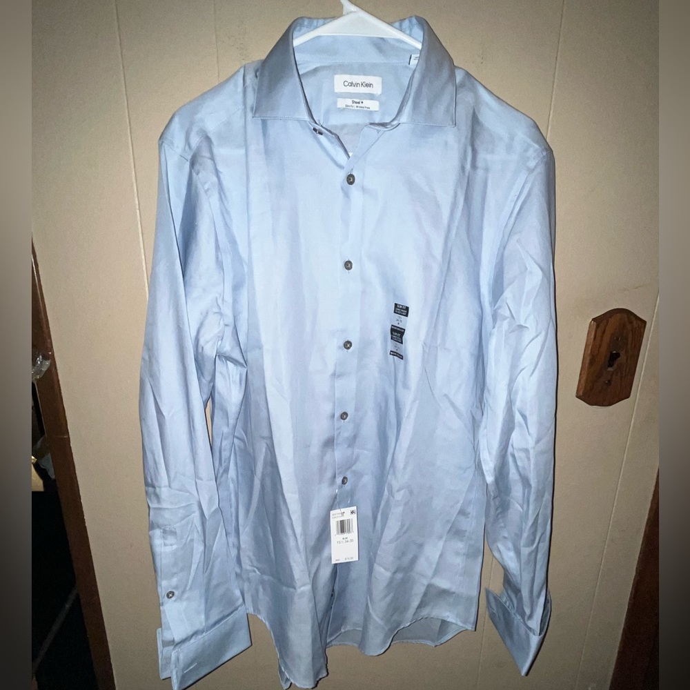NWT/ Calvin Klein light blue dress shirt
